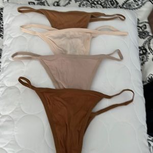 Underwear set of 4 thongs SZ M NEW